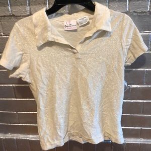 A glittery light grey colored shirt